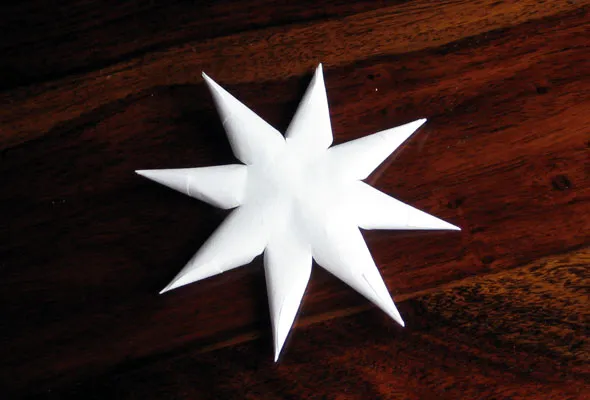 Roll and glue until all eight points are finished